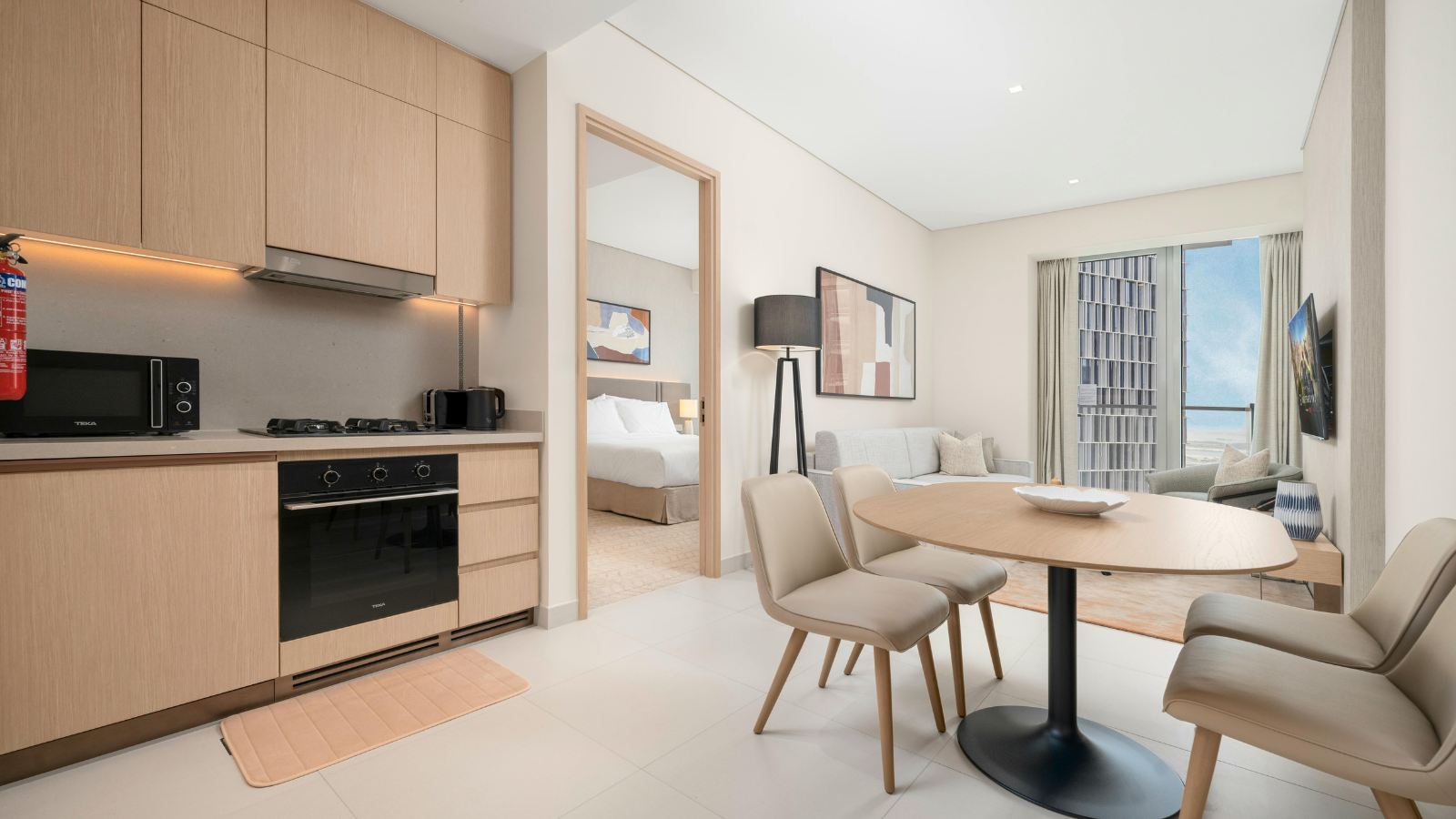Small living room with hidden storage furniture and wall shelving